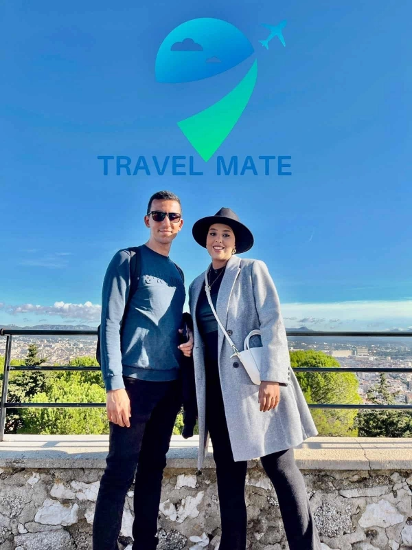 Founders of Travel Mate standing outside during an intentional travel trip